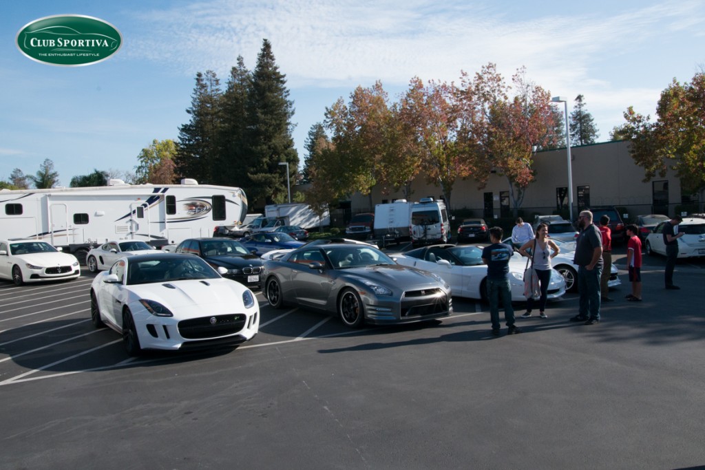 Cars lined up ready to head on a drive through Skyline road and Pescadero